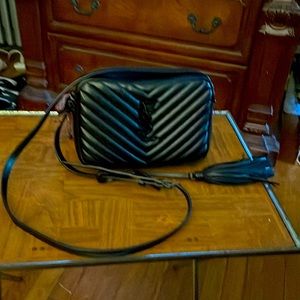 Authentic YSL bag. Barely worn. Top A condition. The color is Black